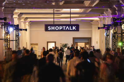 A dynamic longexposure photograph inside a futuristic retail aisle A shopping cart is moving so fast it is blurred into streaks of light The physical