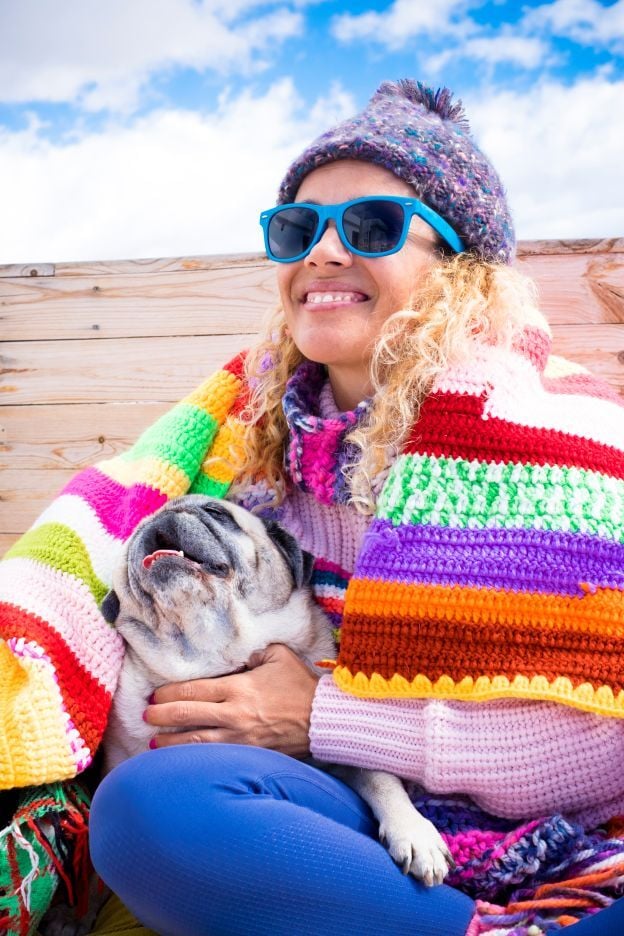 happy-woman-enjoy-her-pug-dog-sitting-outdoor-home-2025-03-08-17-36-23-utc