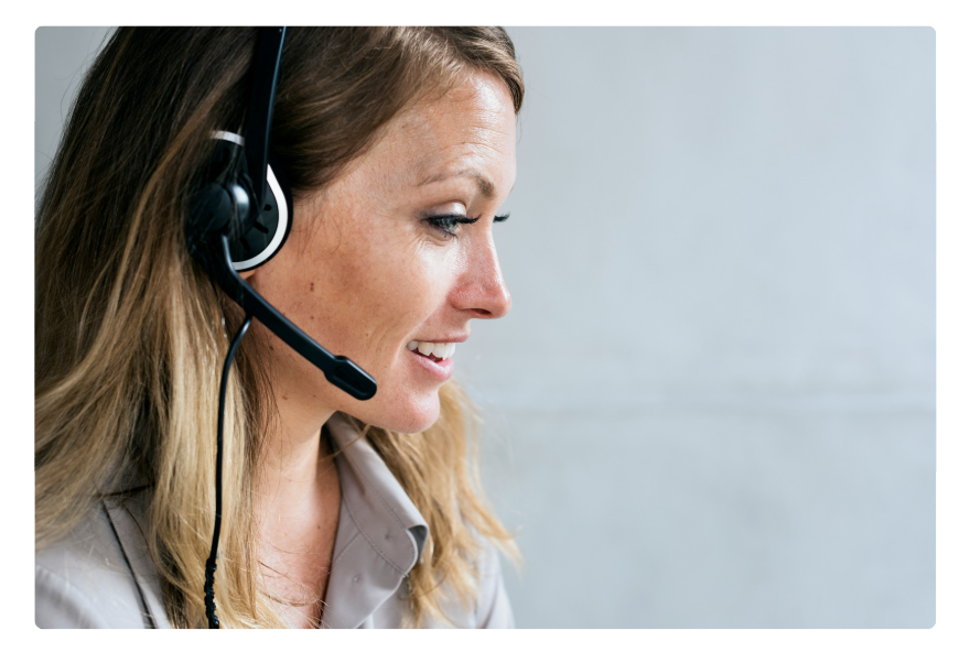 Salesperson on a headset. Salesperson on a headset.