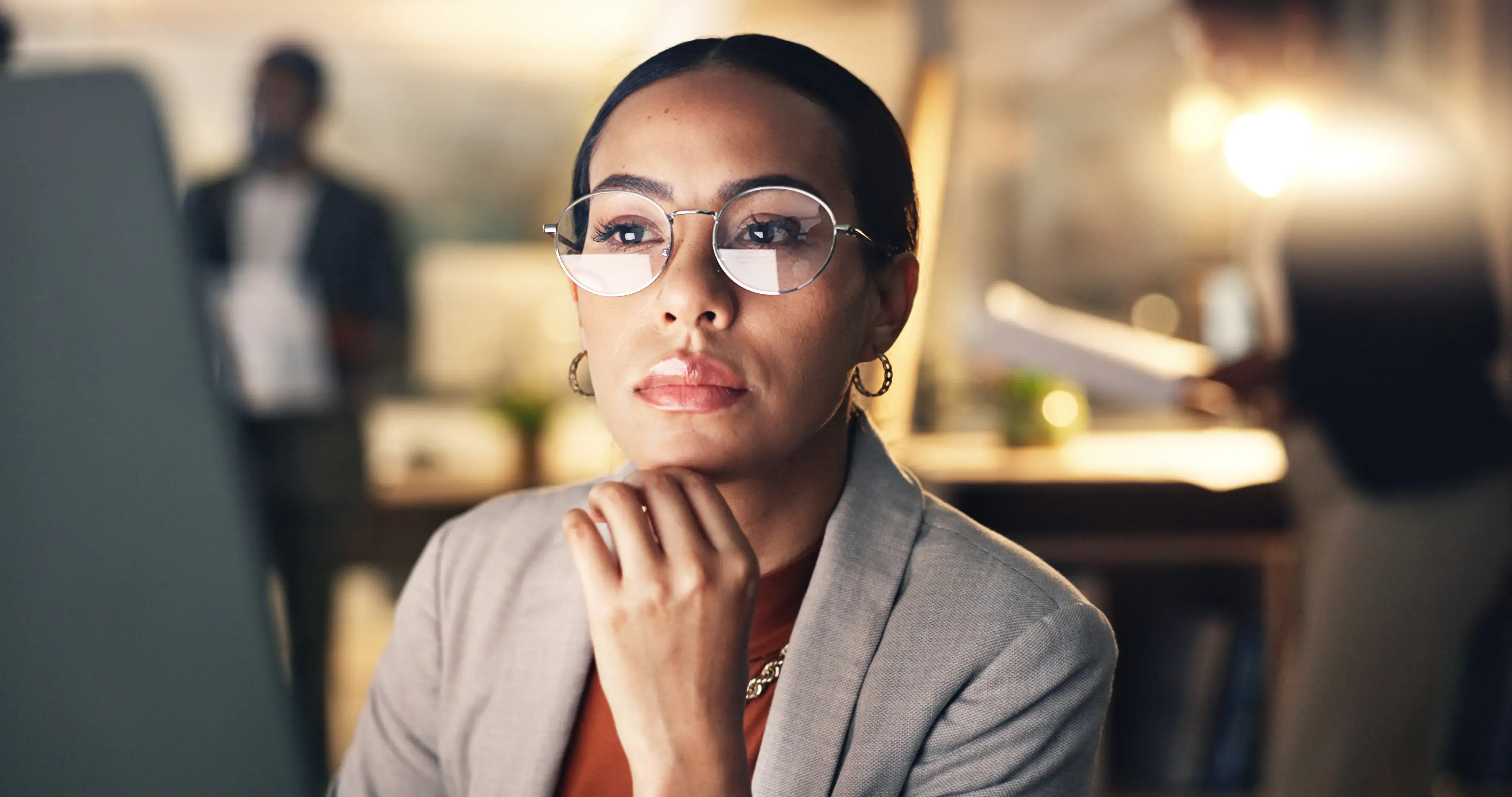 business woman reading on her laptop